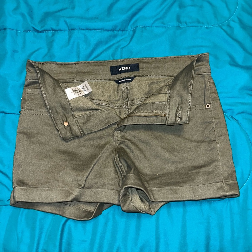 olive green high rise midi shorts